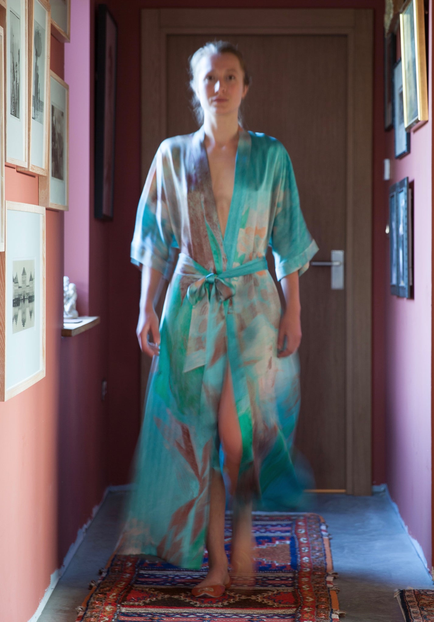 Girl wearing the Conversation aqua robe in pearl satin silk by GvE&Co (Georgina von Etzdorf)